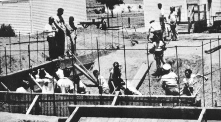 Students building swimming pool ~ Photo from Arvin Federal Emergency School