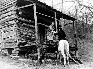 Leaving a typical backwoods house after a book delivery.