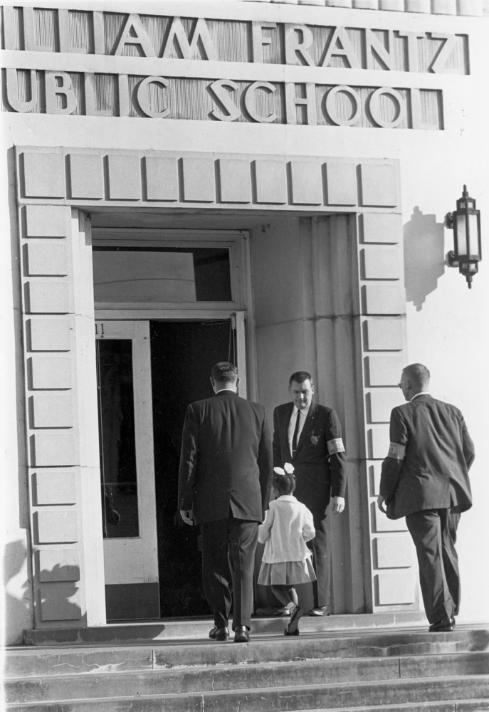 U.S. Marshals escorted Bridges to and from school - Uncredited DOJ photographer